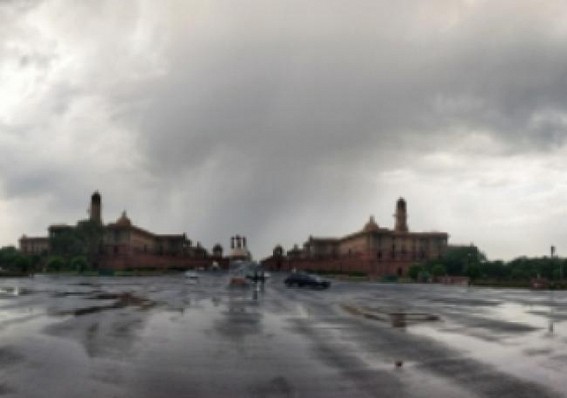 Cloudy sky, light showers cool Delhi a bit